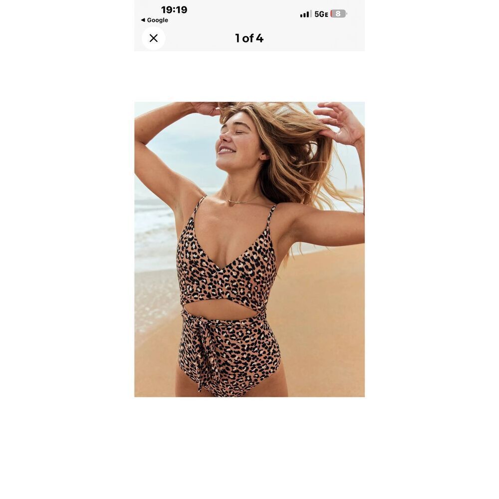 Aerie Leopard Wrap One Piece Swimsuit, featuring adjustable tie straps and a vib